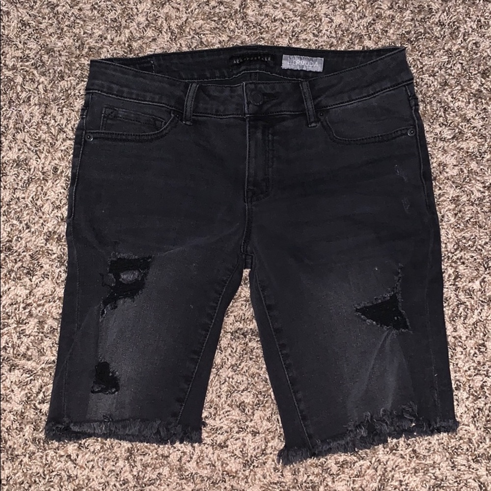 Black ripped shorts